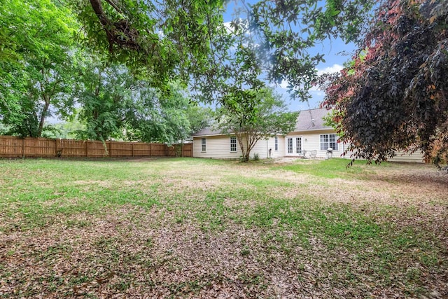 8827 Sapphire Dr, Tallahassee, FL 32309 - view of yard featuring french doors