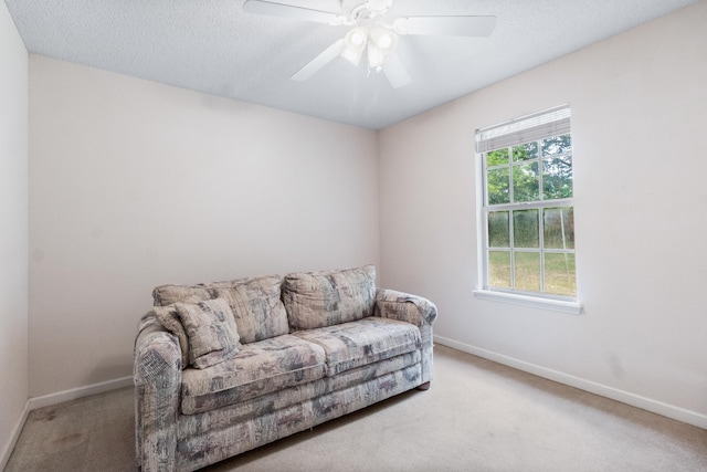 8827 Sapphire Dr, Tallahassee, FL 32309 - sitting room featuring carpet, baseboards, ceiling fan, and a textured ceiling