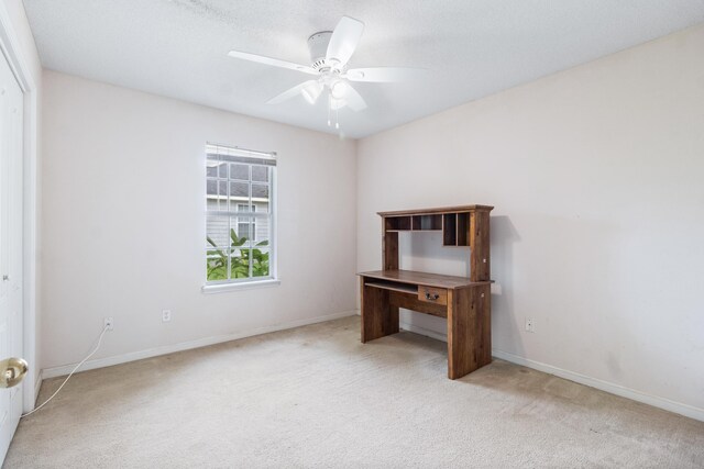 8827 Sapphire Dr, Tallahassee, FL 32309 - unfurnished bedroom featuring light colored carpet, baseboards, and ceiling fan