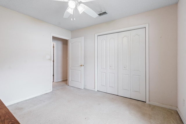 8827 Sapphire Dr, Tallahassee, FL 32309 - unfurnished bedroom with carpet, baseboards, a closet, and a ceiling fan