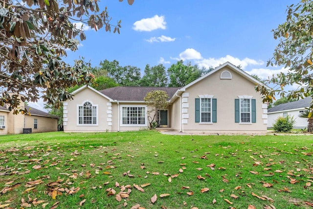 8827 Sapphire Dr, Tallahassee, FL 32309 - view of front facade featuring a front yard and stucco siding