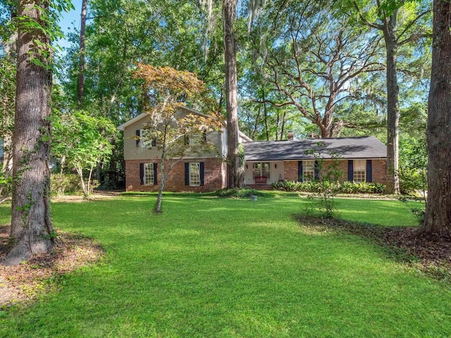 view of front of property with a front lawn