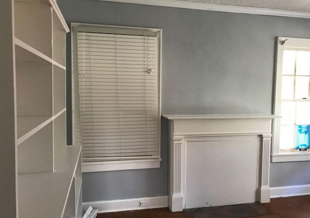 interior details with wood-type flooring and ornamental molding