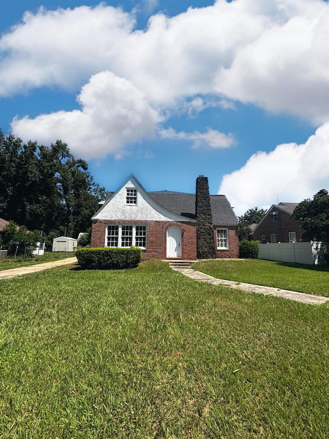 view of front of home with a front yard