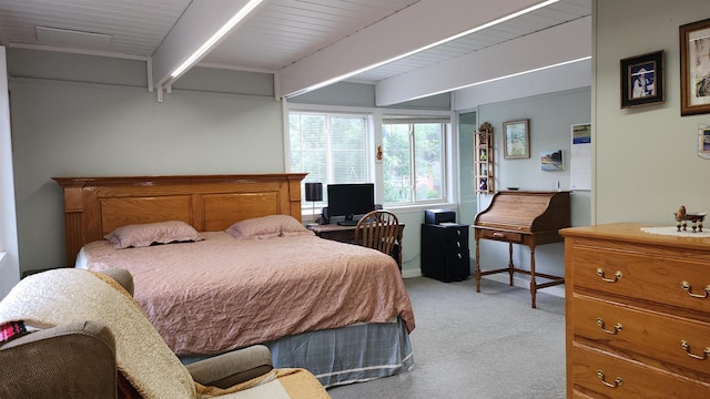220 Belmont Rd Unit 3, Tallahassee, FL 32301 - bedroom with carpet floors and beam ceiling