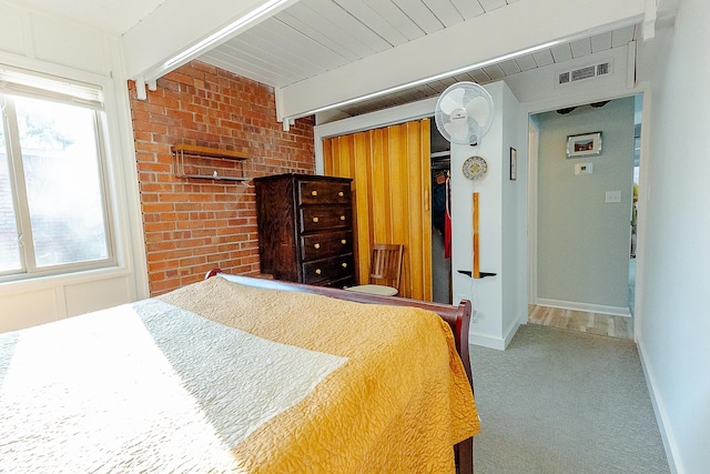220 Belmont Rd Unit 3, Tallahassee, FL 32301 - carpeted bedroom featuring a closet and beamed ceiling
