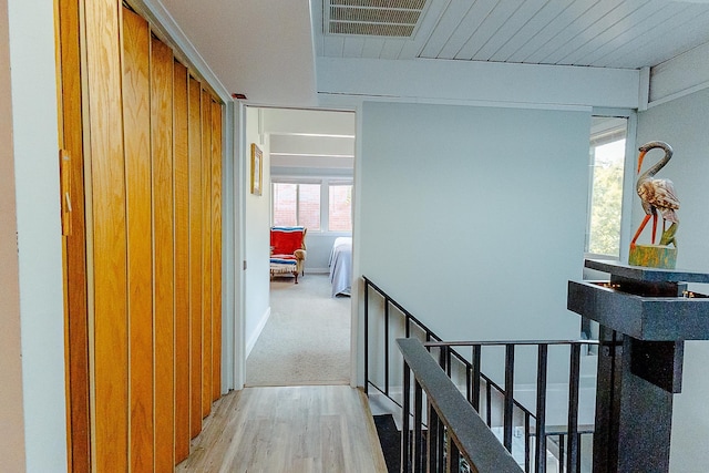 220 Belmont Rd Unit 3, Tallahassee, FL 32301 - corridor with light wood finished floors and an upstairs landing