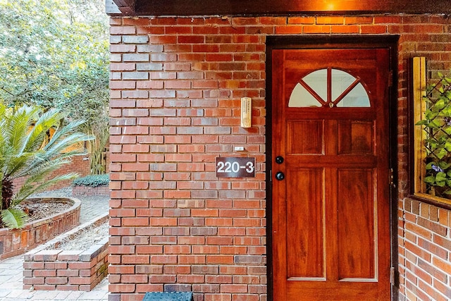 220 Belmont Rd Unit 3, Tallahassee, FL 32301 - doorway to property featuring brick siding