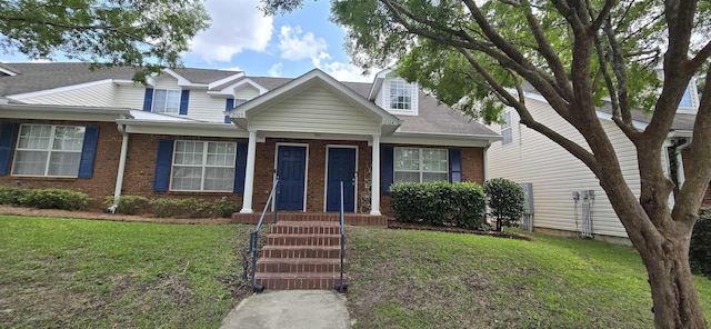 view of front of home with a front lawn