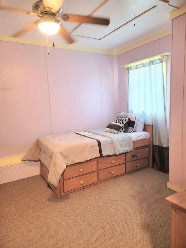 carpeted bedroom with ceiling fan