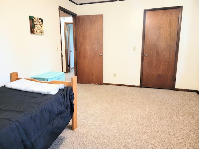 bedroom with light carpet