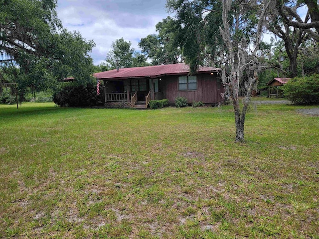 view of yard with a porch