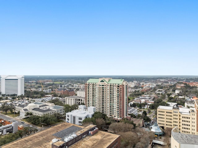 birds eye view of property with a city view