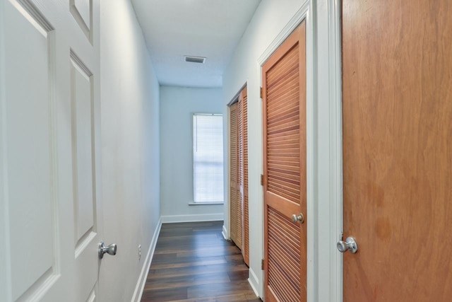 hall featuring dark hardwood / wood-style floors