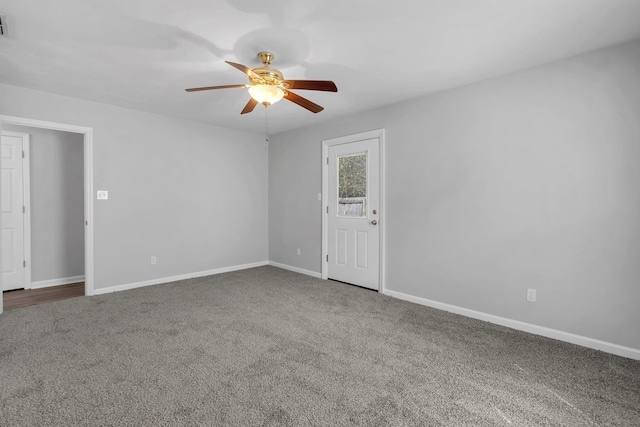 carpeted empty room with ceiling fan