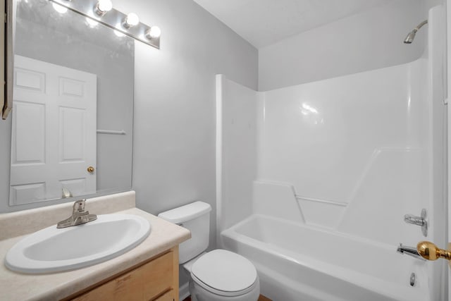 full bathroom with toilet, vanity, and shower / bath combination