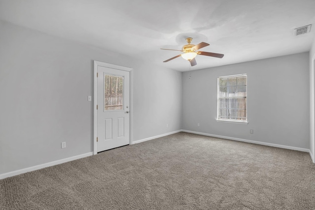 unfurnished room featuring carpet flooring and ceiling fan