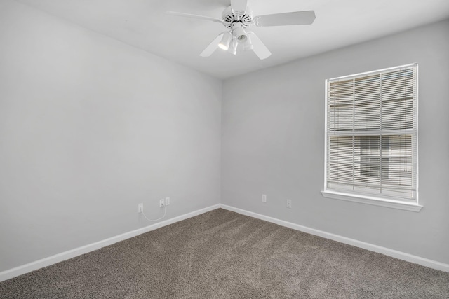 carpeted empty room with ceiling fan