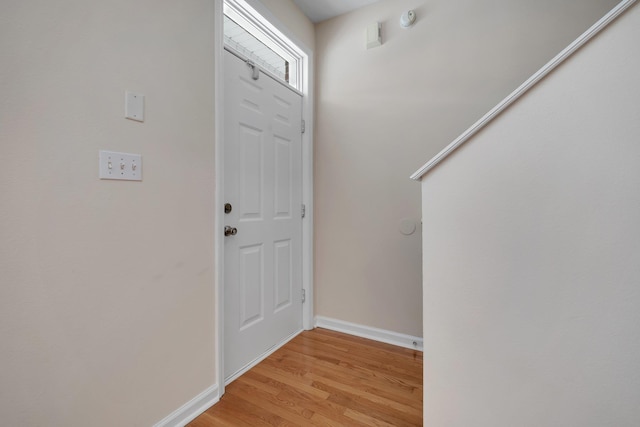 doorway to outside featuring light wood-type flooring