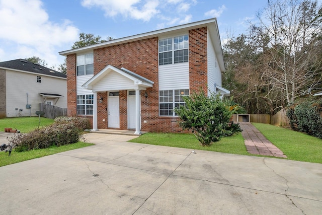 view of front of home with a front lawn