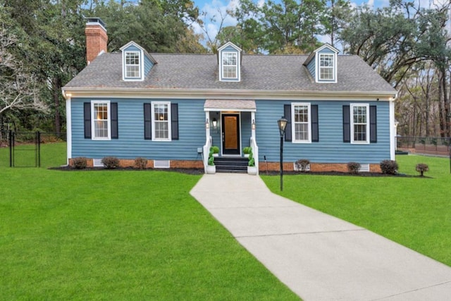 new england style home featuring a front yard