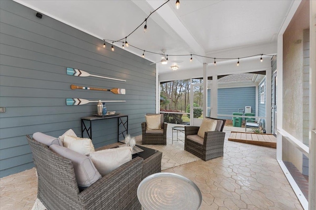 sunroom / solarium with beamed ceiling