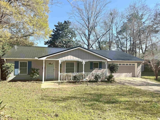 ranch-style house featuring a porch, brick siding, and an attached garage