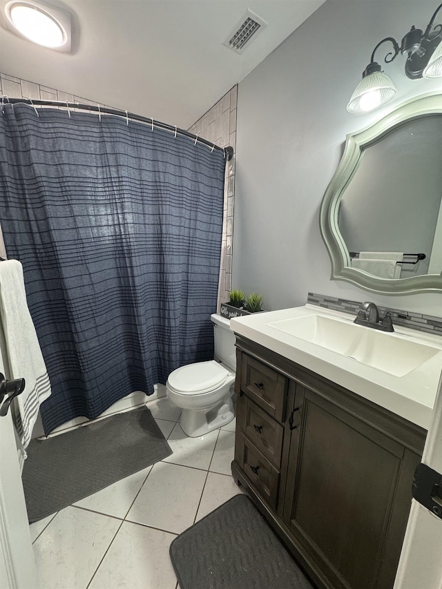 full bathroom with visible vents, toilet, vanity, a shower with curtain, and tile patterned floors