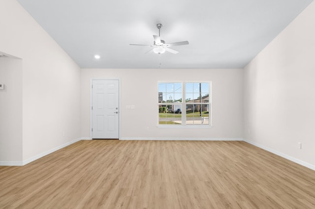 interior space featuring ceiling fan and light hardwood / wood-style flooring