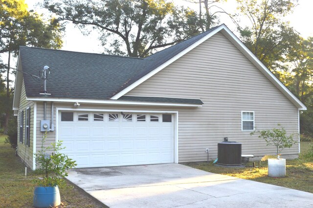 view of side of property with cooling unit