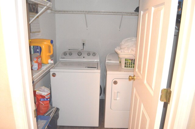 washroom featuring washer and dryer