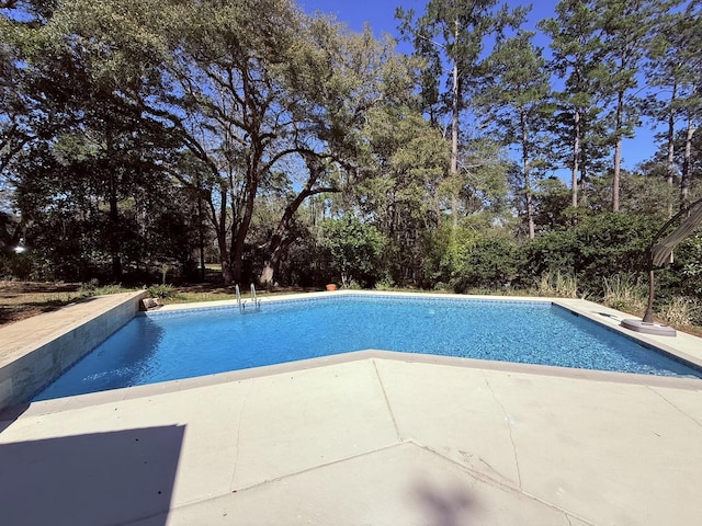 pool featuring a patio