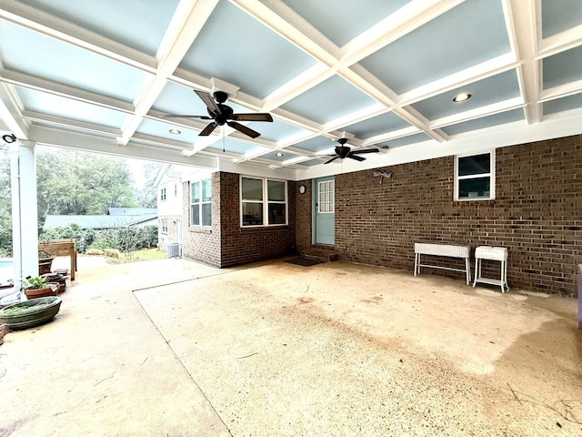 view of patio featuring ceiling fan