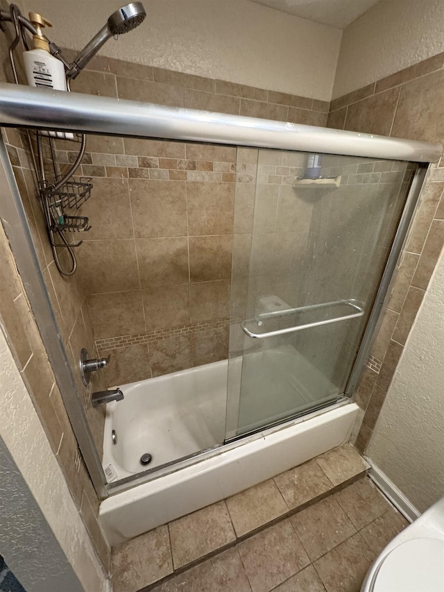 2408 Ionic Ct, Tallahassee, FL 32303 - full bathroom with a textured wall and enclosed tub / shower combo
