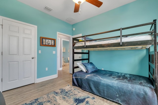 bedroom featuring ceiling fan and light hardwood / wood-style floors