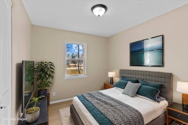 bedroom featuring light hardwood / wood-style floors