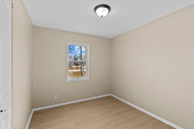 unfurnished room featuring light wood-type flooring