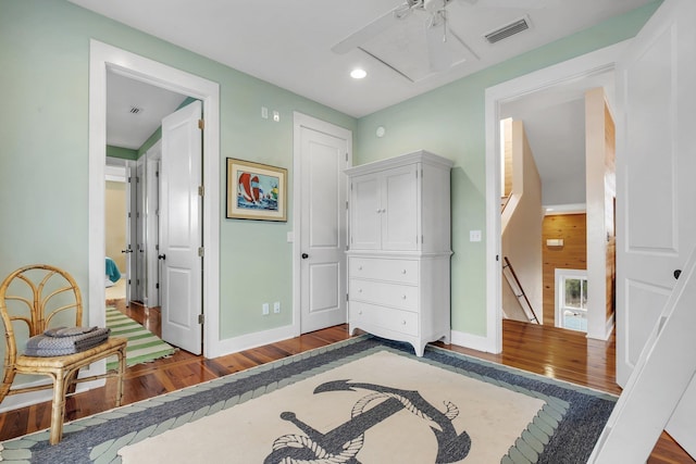 bedroom featuring a closet and dark hardwood / wood-style floors