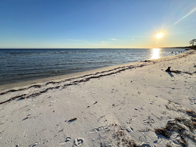 view of water feature with a beach view