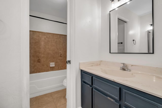 1541 San Luis Rd, Tallahassee, FL 32304 - bathroom with tile patterned floors, vanity, toilet, and bathtub / shower combination