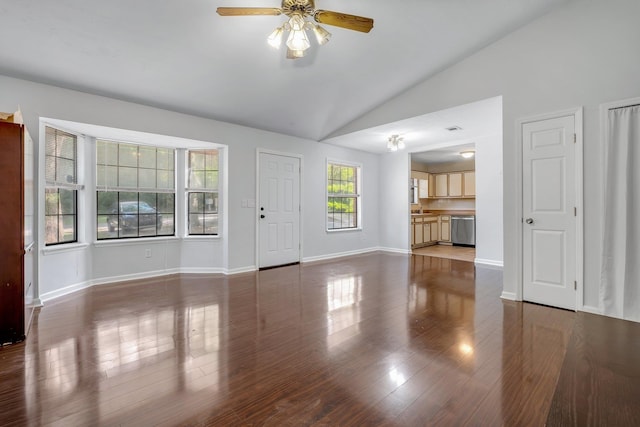 1541 San Luis Rd, Tallahassee, FL 32304 - unfurnished living room featuring a ceiling fan, baseboards, wood finished floors, and lofted ceiling