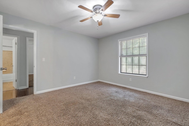 1541 San Luis Rd, Tallahassee, FL 32304 - unfurnished room featuring baseboards, ceiling fan, and carpet