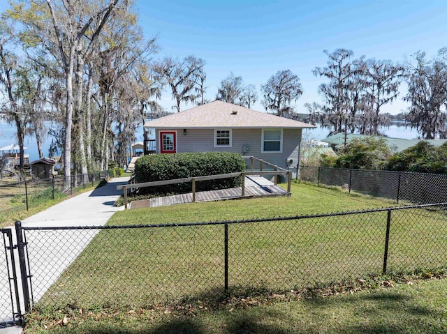 exterior space with a lawn and fence private yard