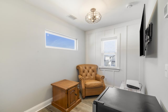 living area featuring light hardwood / wood-style floors