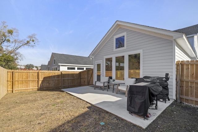 rear view of house with a patio