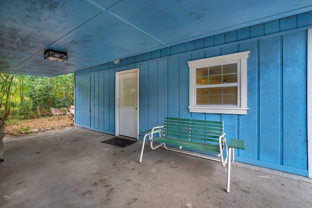 doorway to property featuring a patio area