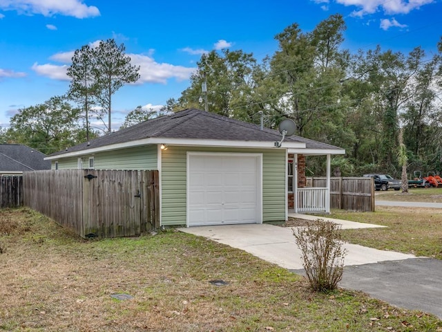 garage with a lawn