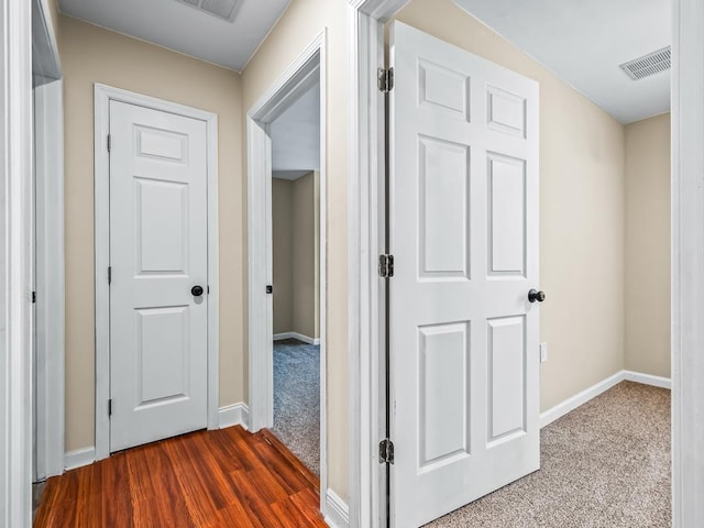 hall featuring wood-type flooring