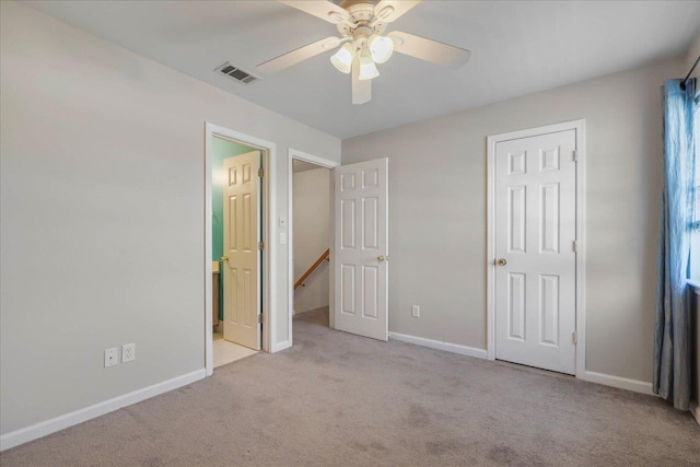 787 E Timberwood Cir, Tallahassee, FL 32304 - unfurnished bedroom featuring carpet floors, baseboards, and a ceiling fan