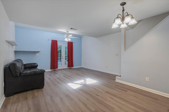 787 E Timberwood Cir, Tallahassee, FL 32304 - living area with wood finished floors, baseboards, and a chandelier